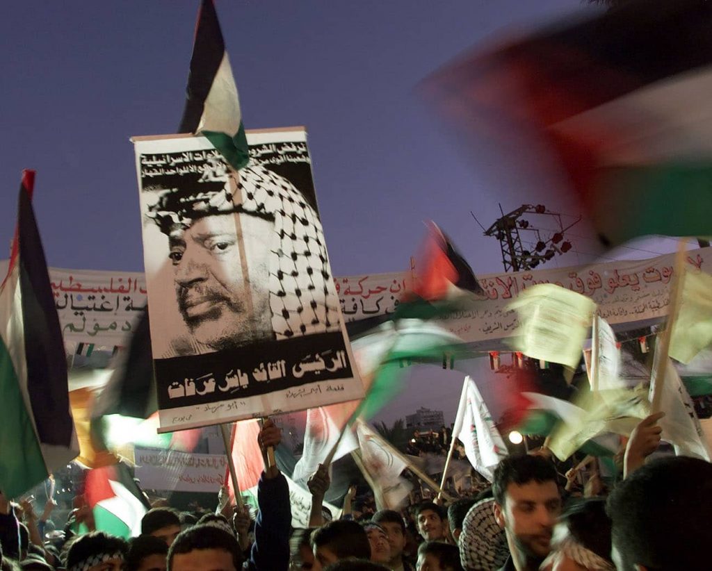  This was no intifada—uprising from below—but a terror campaign directed from above.  Fatah supporters rally in Gaza, December 2000. Photo credit: Reuters