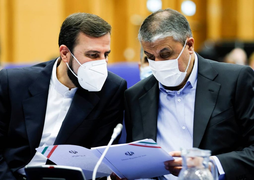 Iranian Atomic Energy Agency Chief Mohammad Eslami and Iran's Ambassador to the IAEA Kazem Gharibabadi at the opening of the IAEA General Conference in Vienna, September 2021. Photo credit: REUTERS/Leonhard Foeger