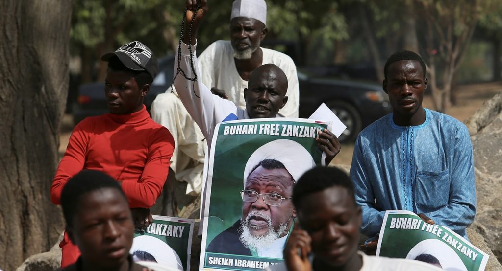 Protesters hold banners calling for the release of Sheikh Ibrahim Zakzaky in Nigeria. Photo credit: REUTERS.