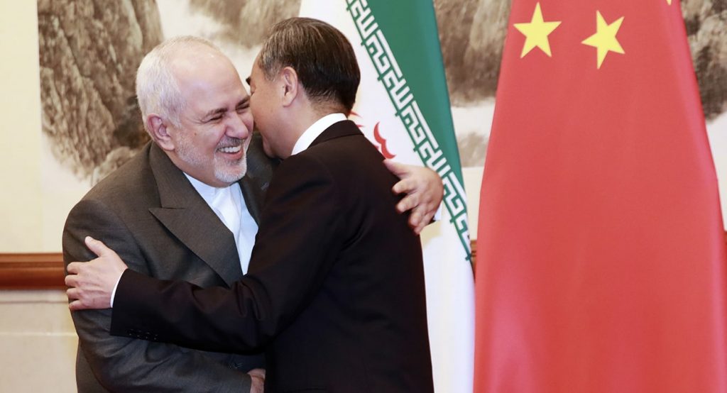 Chinese Foreign Minister Wang Yi meets Iranian former Foreign Minister Mohammad Javad Zarif in Beijing in 2019. Photo credit: REUTERS.