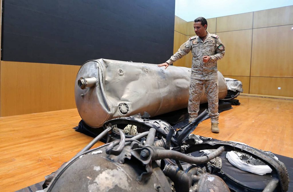 Saudi-led coalition spokesman, Colonel Turki al-Malki, displays the debris of a ballistic missile which he says was launched by Yemen’s Houthi group towards the capital Riyadh. Photo credit: REUTERS