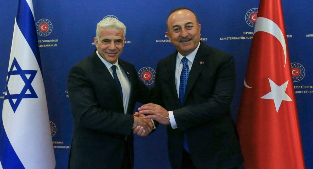 Turkish Foreign Minister Mevlut Cavusoglu and Israeli Prime Minister Yair Lapid meet in Ankara. Photo credit: REUTERS