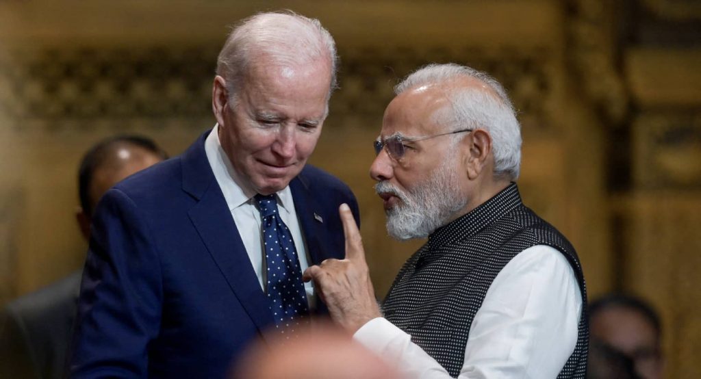 US President Joe Biden talks with India's Prime Minister Narendra Modi at the opening of the G20 Summit, November 15, 2022. Photo credit: BAY ISMOYO/Pool via REUTERS