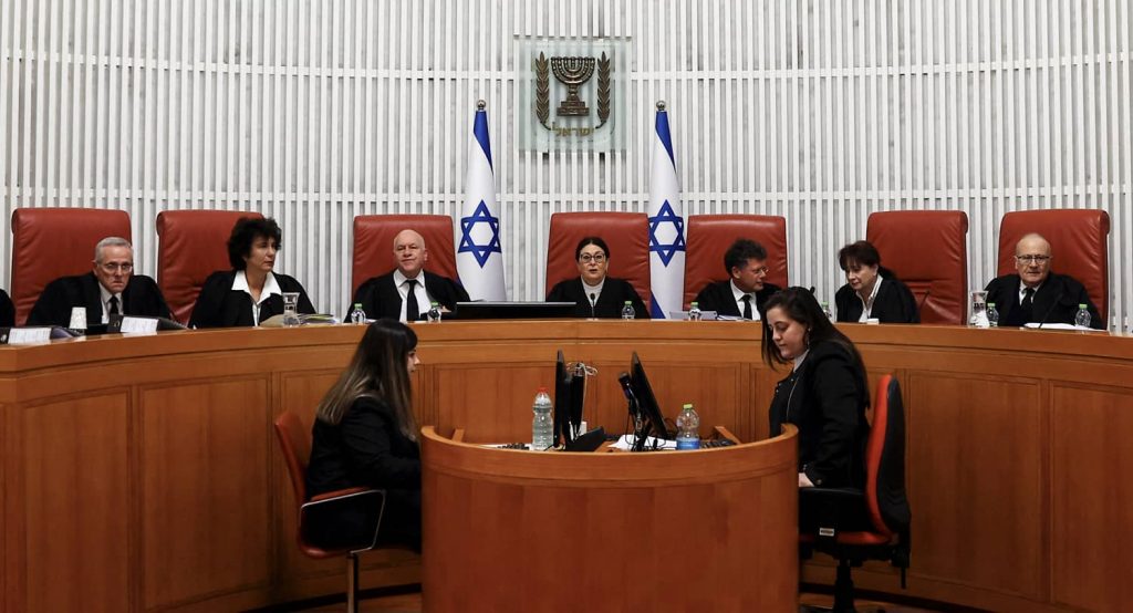 Chief Justice Esther Hayut and fellow Israeli Supreme Court judges. Photo credit: REUTERS/Ronen Zvulun