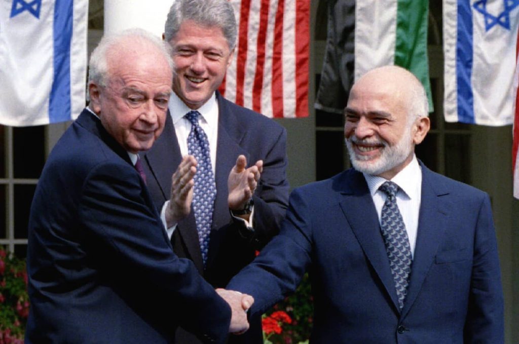 Israeli Prime Minister Yitzhak Rabin and Jordan's King Hussein shaking hands at the White House, signalling their intent to make a formal peace. Photo credit: Reuters / Win McNamee