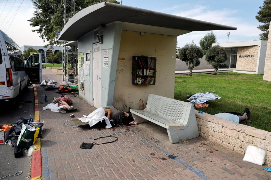 Bodies of people murdered by Hamas terrorists on October 7, 2023, in Sderot, outhern Israel. Photo credit: REUTERS/Ammar Awad.