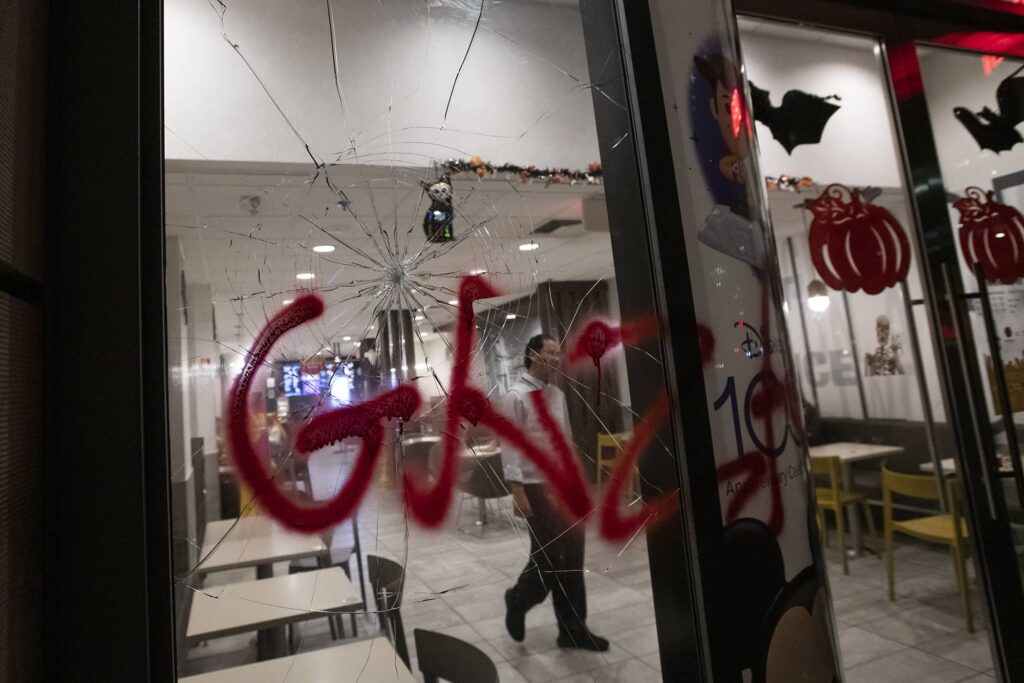 A window is smashed and graffiti sprayed with the word “Gaza” at a restaurant in Washington, DC, November 2023. Photo credit: Rod Lamkey/CNP/Sipa USA via Reuters Connect.