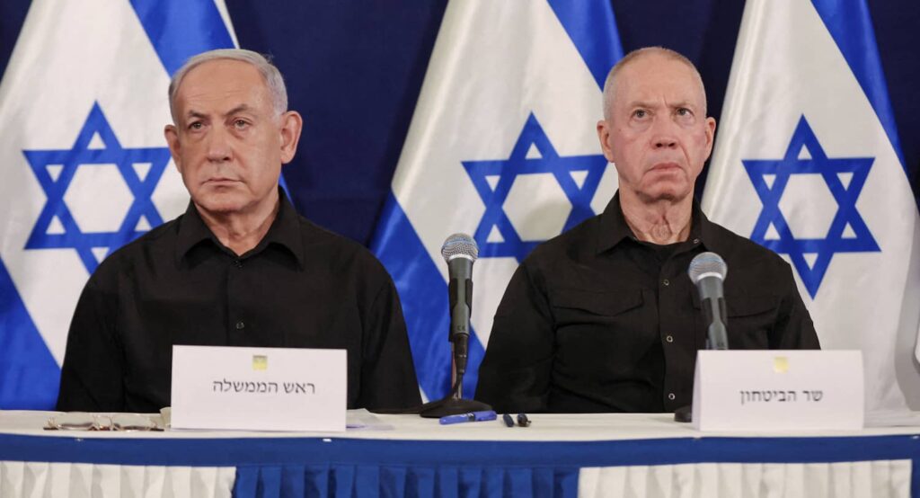 Israeli Prime Minister Benjamin Netanyahu and Defense Minister Yoav Gallant during a press conference in Tel Aviv, October 2023. Photo credit: ABIR SULTAN POOL/Pool via REUTERS.