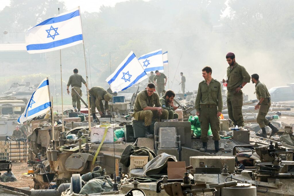 Israeli soldiers near the Israel-Gaza border. Photo credit: REUTERS/Violeta Santos Moura.