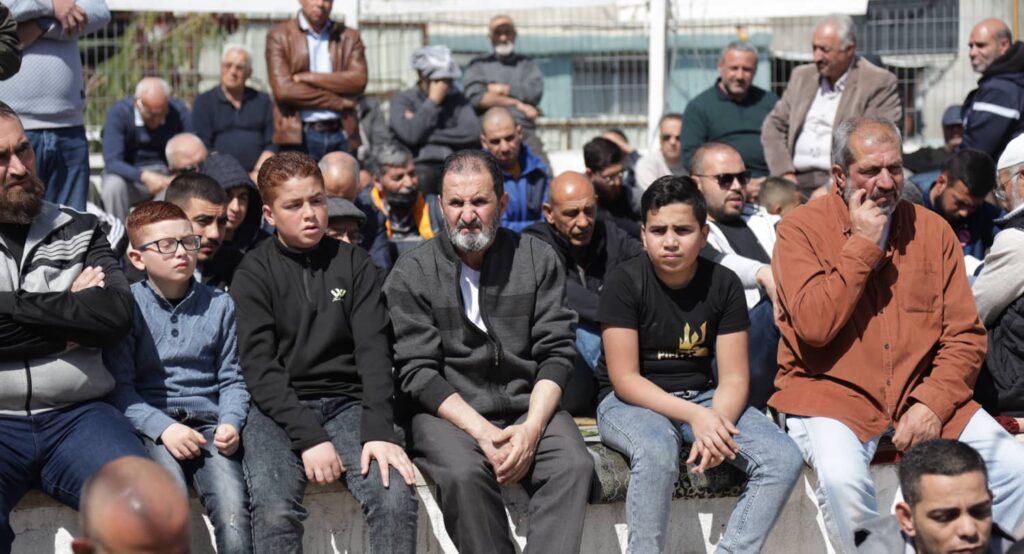 Muslim worshippers attend Friday prayers in the Arab neighborhood of Silwan in East Jerusalem. Photo credit: Saeed Qaq / SOPA Images/Sipa USA via Reuters Connect.