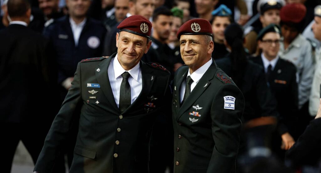 IDF Chief of Staff Hertzi Halevi (on left) with his predecessor Aviv Kochavi. Photo credit: REUTERS/Amir Cohen.